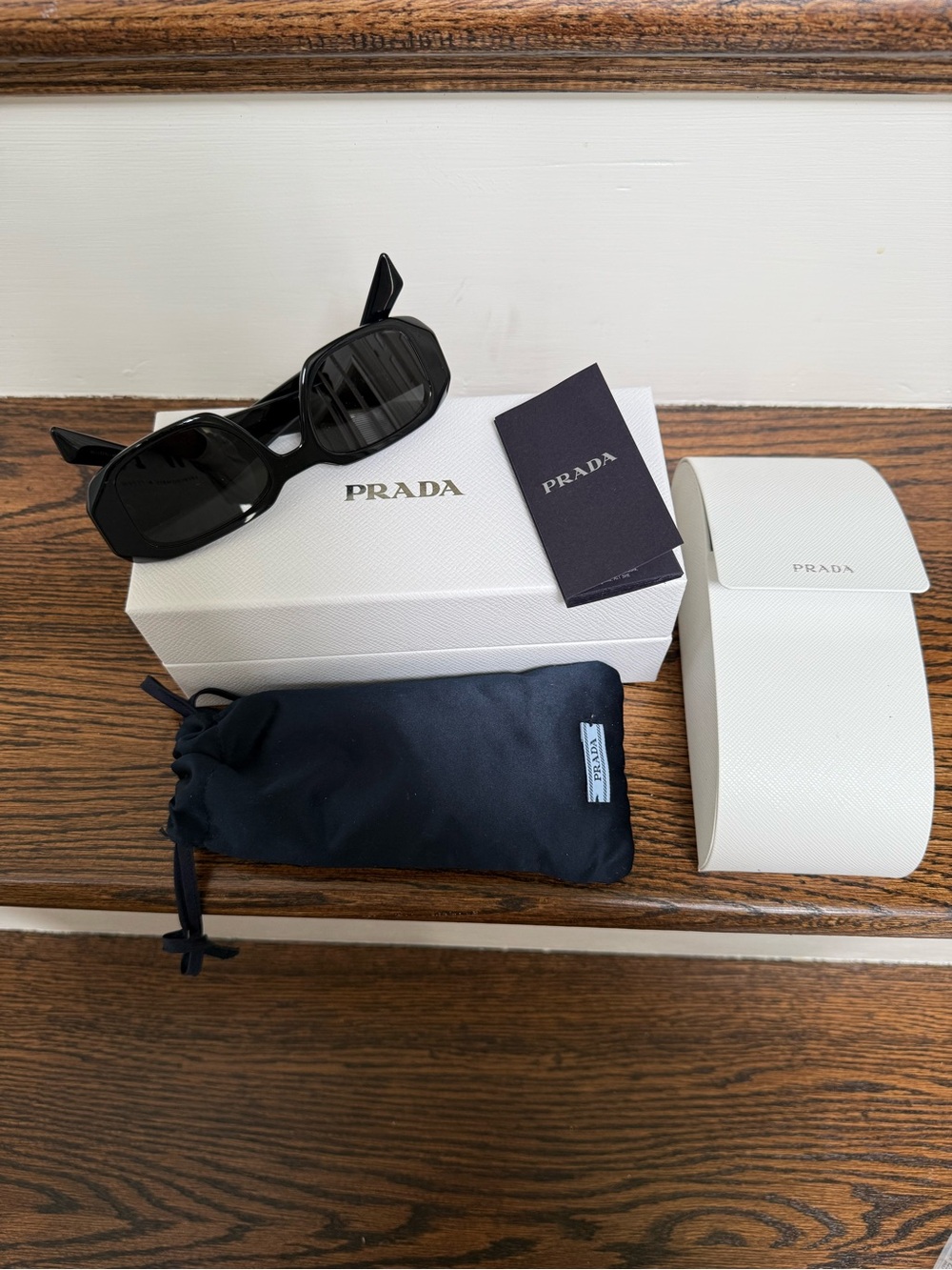 Prada Black Rectangular Sunglasses with Gold Logo Accent